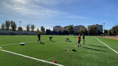 students training at the stadium
