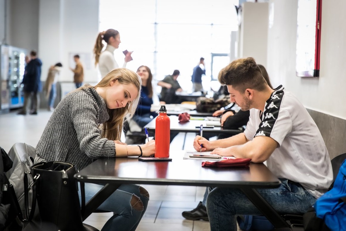 Students in the study hall share the University spaces designated for them
